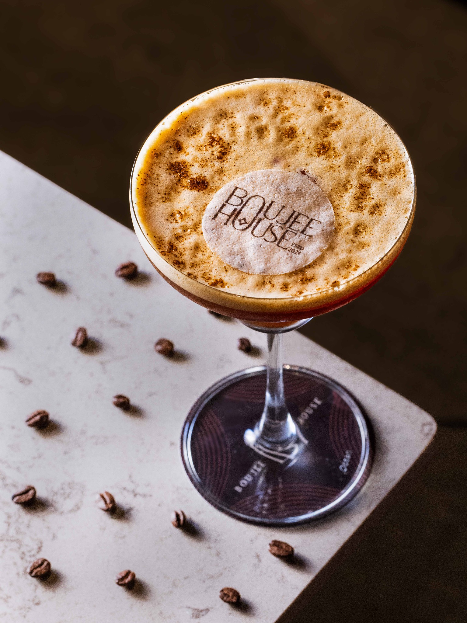 Signature cocktail with espresso foam